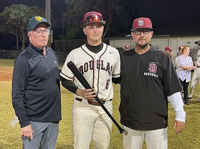 Niko Benestad (center) was named MVP photo BCAA Tournament. He posed with Pat McQuaid (left) and Stoneman Douglas head coach Todd Fitz-Gerald. (3/1/2024)